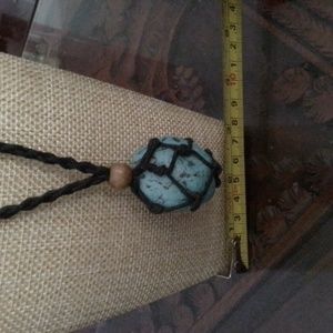 Crystal holder necklace with large turquoise stone